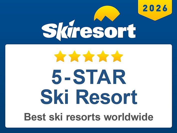 Logo de un resort de esquí 5 estrellas que dice 'Mejores estaciones de esquí del mundo' y muestra el año 2026.