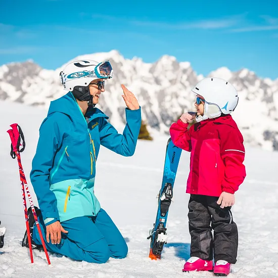 Young family ski pass