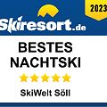 Grafik von Skiresort.de mit der Aufschrift „Bestes Nachtski – 5 Sterne – SkiWelt Söll“, ausgezeichnet für das Jahr 2023.