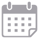Ikona kalendarza z zaznaczonymi dniami. Szara grafika z zagiętym rogiem w prawym dolnym rogu.