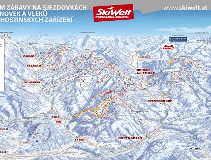 Mapa lyžařského střediska SkiWelt zobrazující sjezdovky a lanovky v zasněžených horách s turistickými informacemi a logem střediska.