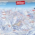 Eine detaillierte Ski-Piste-Karte der SkiWelt Wilder Kaiser-Brixental. Sie zeigt 275 km Pisten, 81 Bahnen und Lifte sowie 80 urige Hütten in einer bergigen Winterlandschaft.